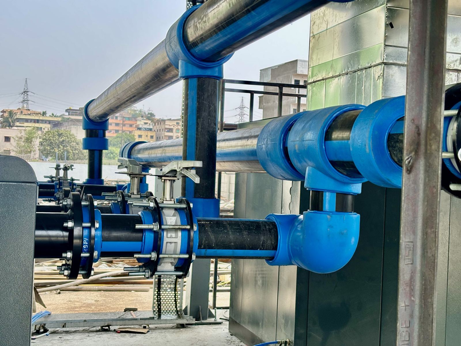 Anjney PPCH compressed-air header with valves at a dryer outlet